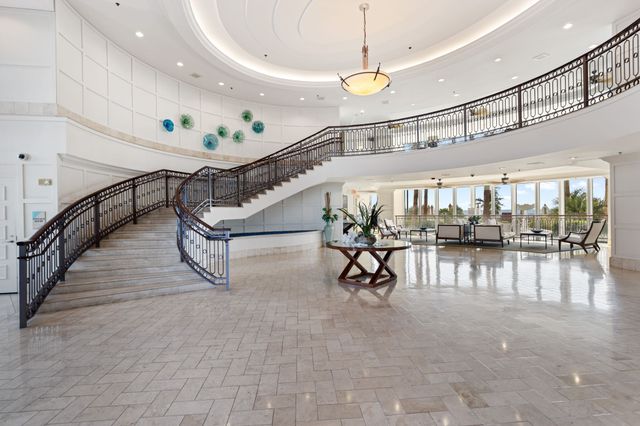 a view of a balcony with furniture