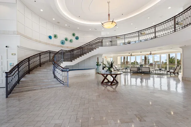 a view of a balcony with furniture