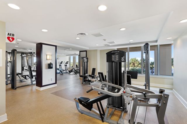 a view of swimming pool with outdoor seating