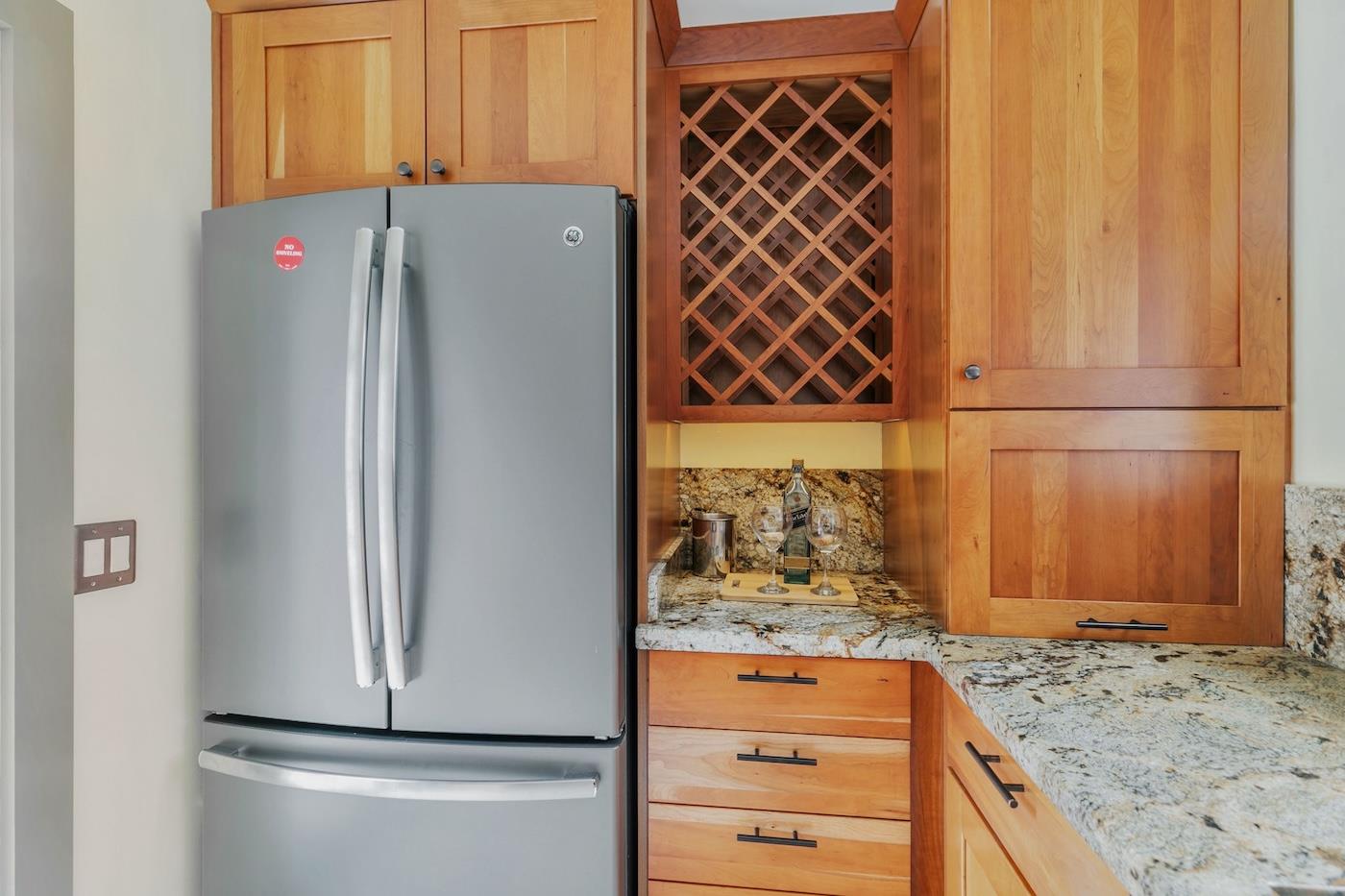 411 Hecker Pass Road Watsonville, CA 95076 - Photo 12 of 76 a view of storage and utility room with wooden floor