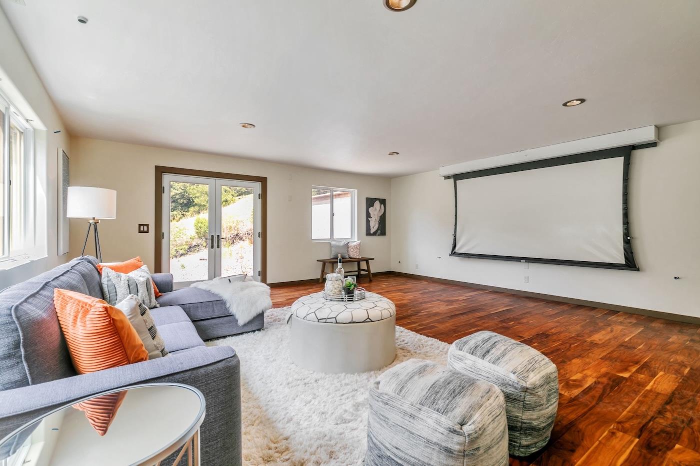 411 Hecker Pass Road Watsonville, CA 95076 - Photo 25 of 76 a living room with furniture and a large window
