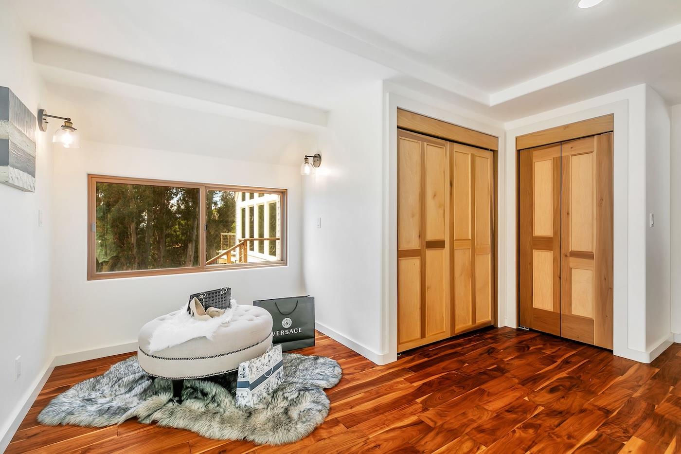411 Hecker Pass Road Watsonville, CA 95076 - Photo 32 of 76 a living room with a couch and a table