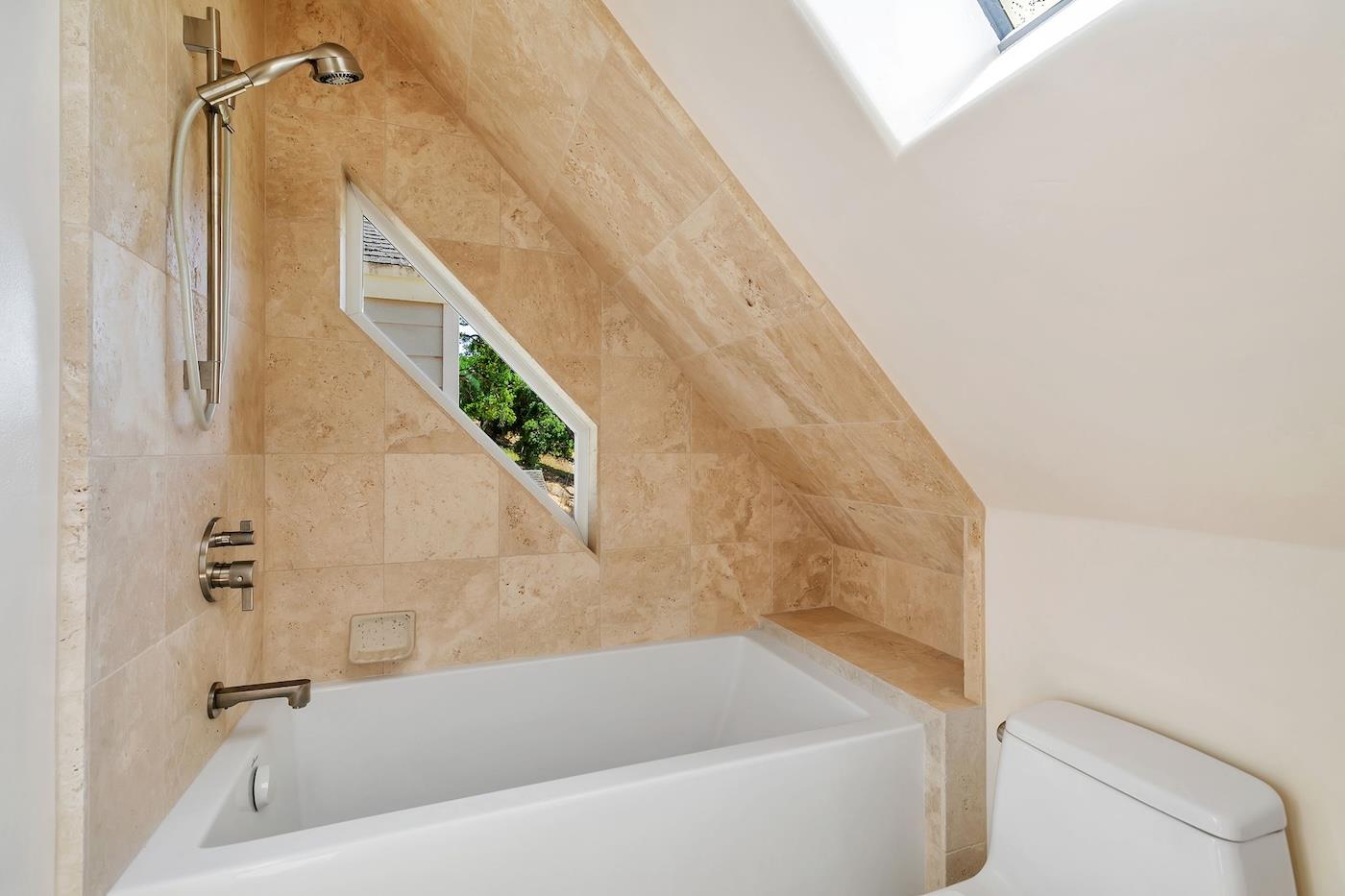 411 Hecker Pass Road Watsonville, CA 95076 - Photo 56 of 76 a bathroom with a bathtub