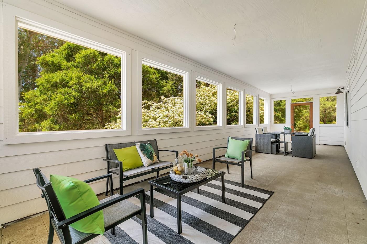 411 Hecker Pass Road Watsonville, CA 95076 - Photo 57 of 76 a living room with furniture and a window