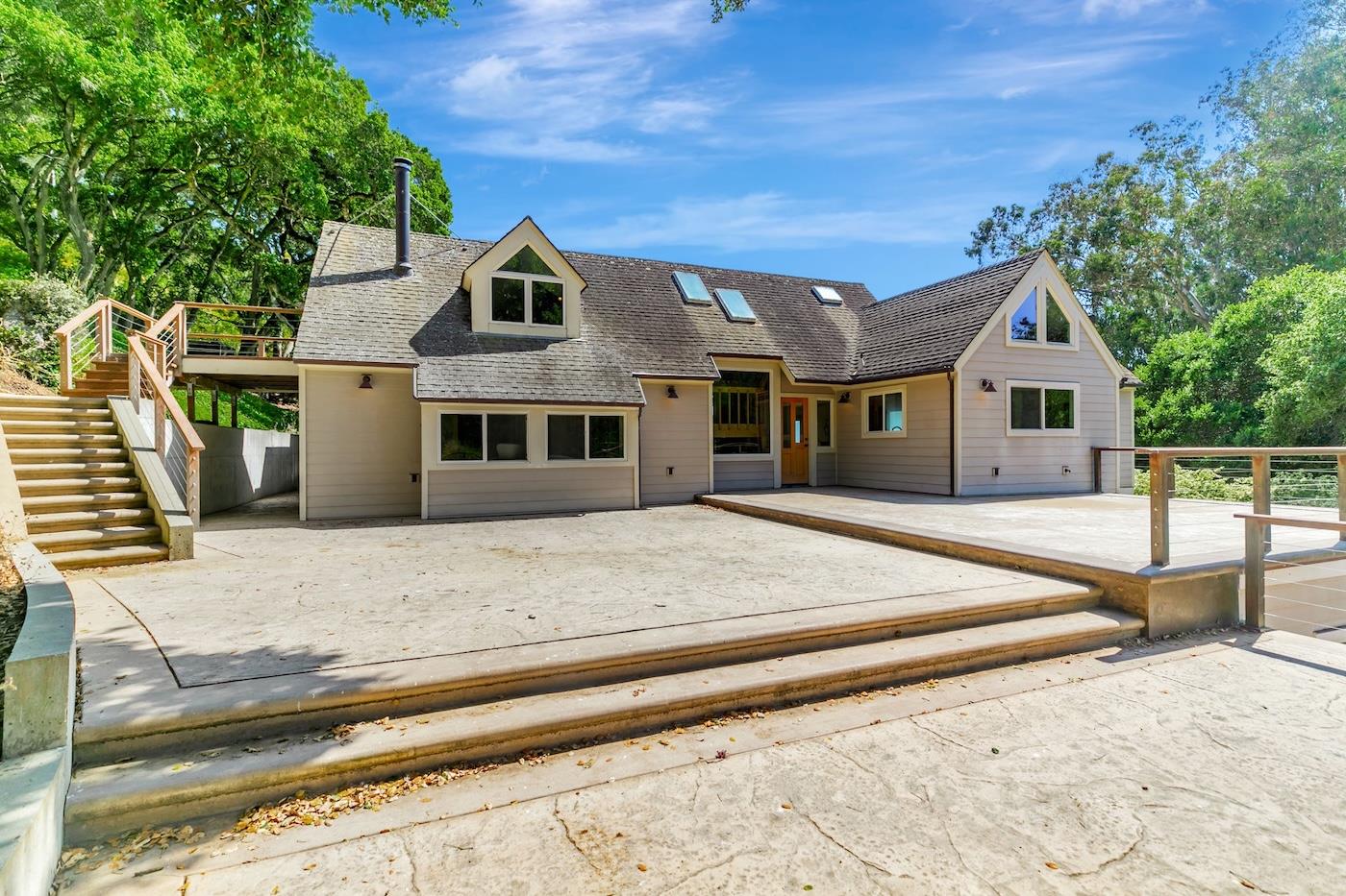411 Hecker Pass Road Watsonville, CA 95076 - Photo 73 of 76 a front view of a house with a porch
