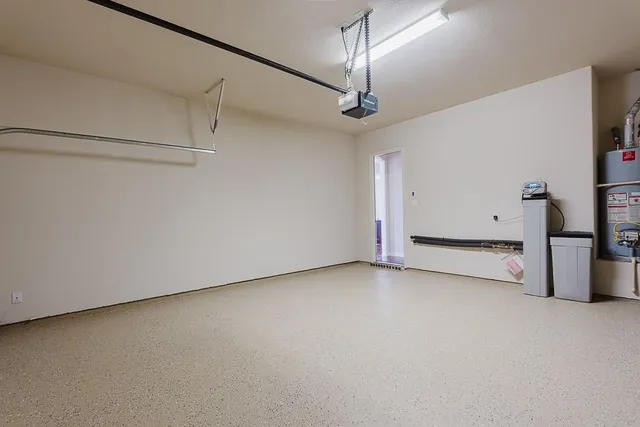 a view of a room with closet and a ceiling fan