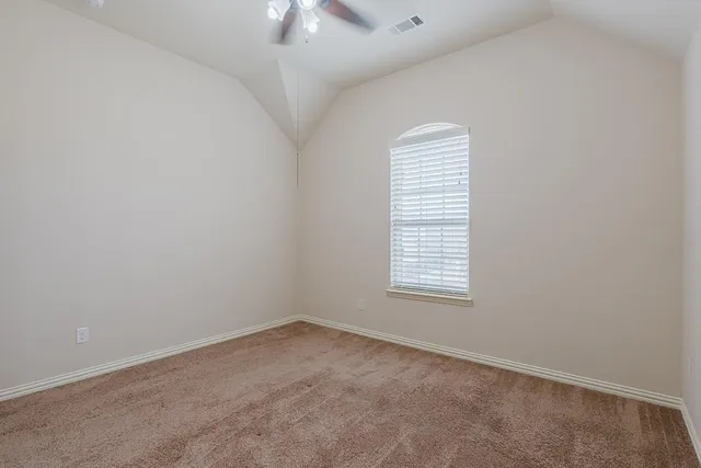 a view of hallway with chandelier