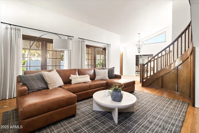 a kitchen with a table chairs stove and cabinets