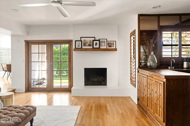 a bedroom with a bed and a table