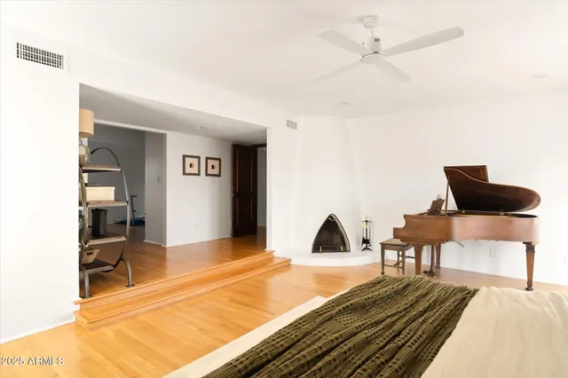 a bathroom with a sink a vanity and a window