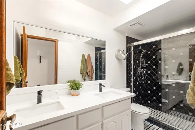 a living room with furniture a rug and a window