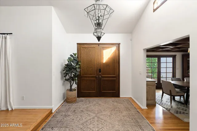 a living room with furniture fireplace and a flat screen tv