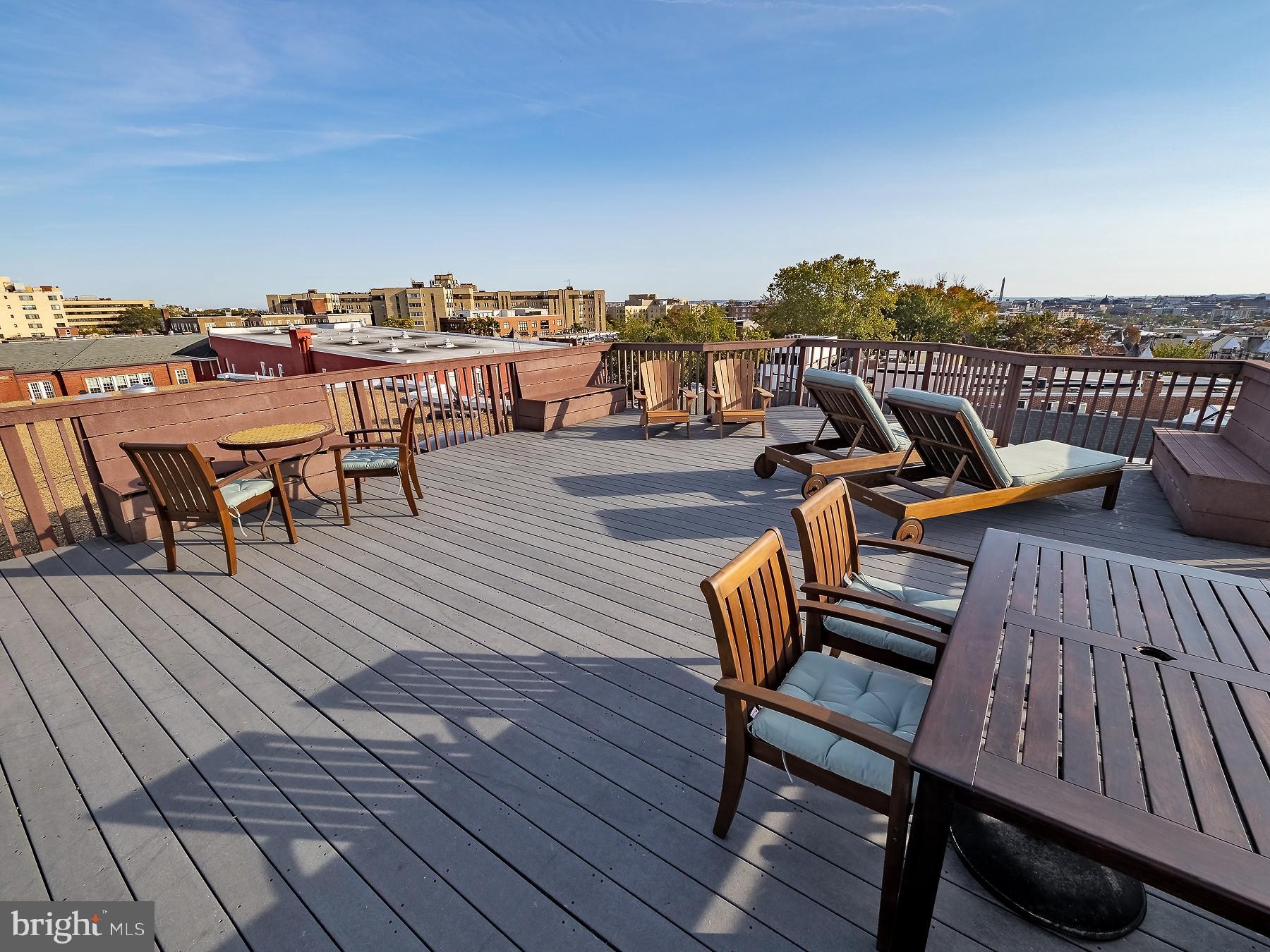 1736 Columbia Road Northwest, Unit 309 Washington, DC 20009 - Photo 26 of 38 a view of a terrace with seating area