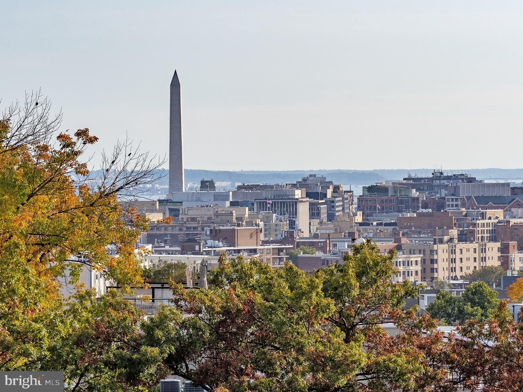 1736 Columbia Road Northwest, Unit 309 Washington, DC 20009 - Photo 27 of 38 a view of a city with tall buildings