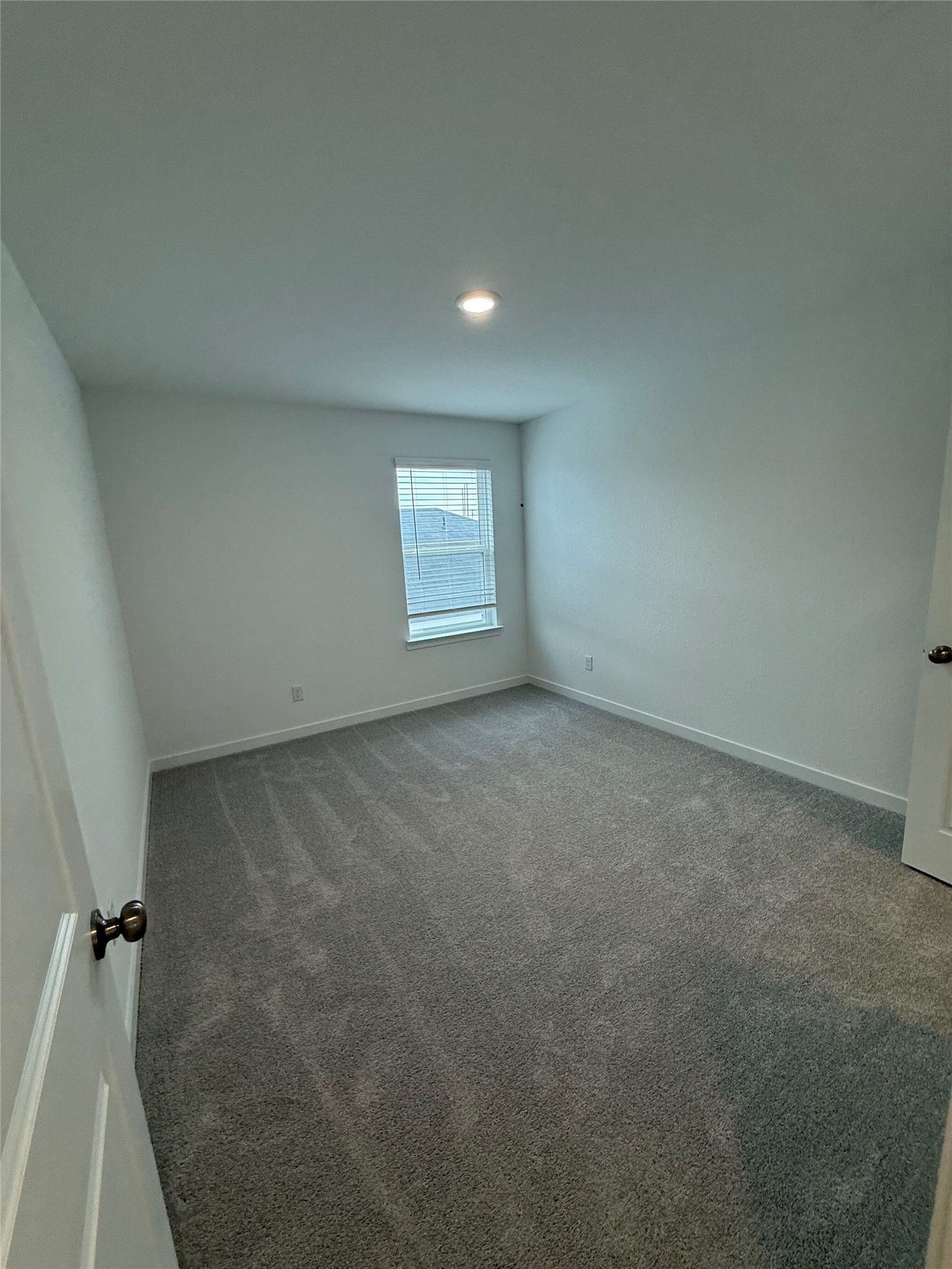 138 Golden Bell Way Buda, TX 78610 - Photo 15 of 17 an empty room with a window