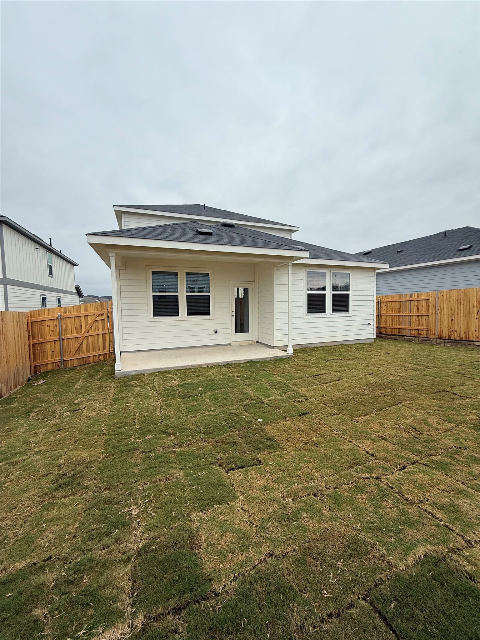 138 Golden Bell Way Buda, TX 78610 - Photo 2 of 17 a house with a yard