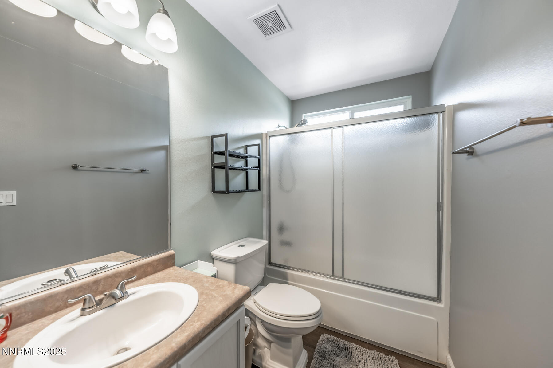 7447 Findhorn Drive Reno, NV 89506 - Photo 17 of 27 a bathroom with a sink toilet and shower