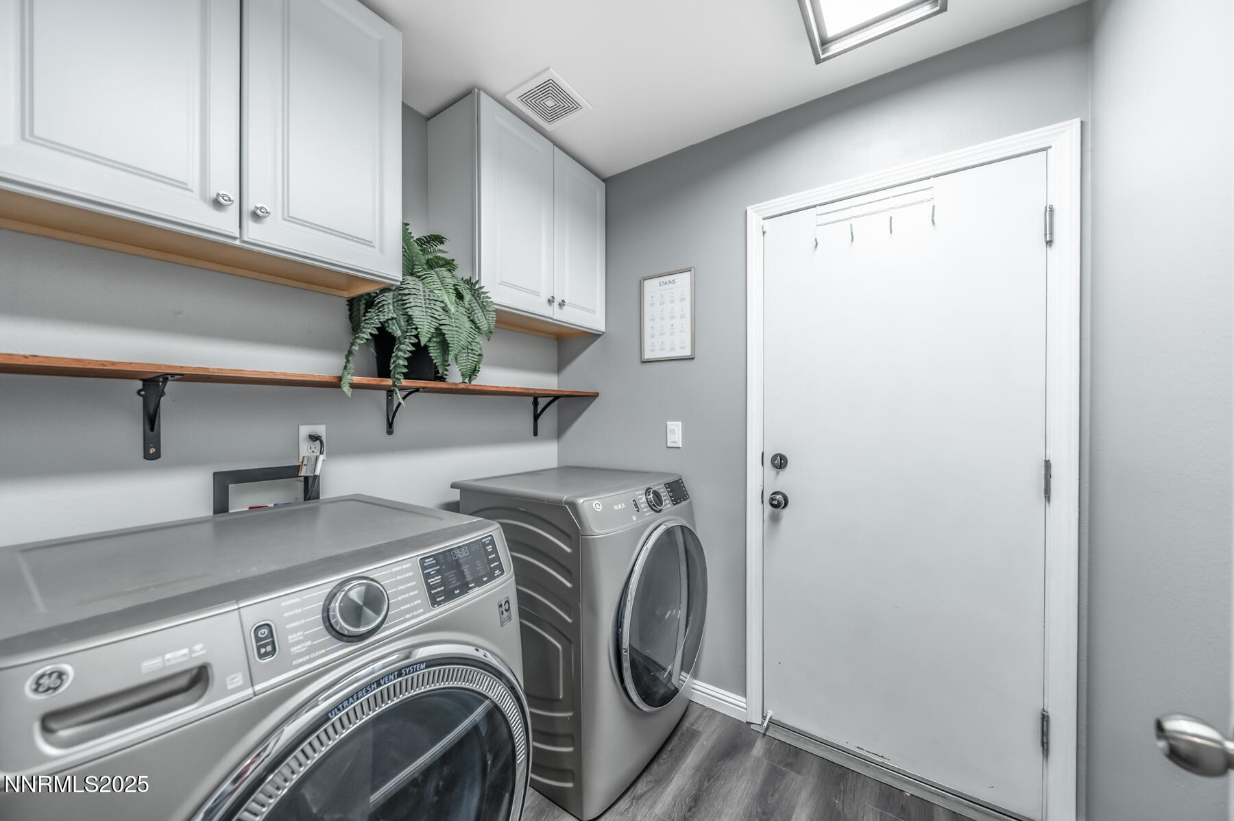 7447 Findhorn Drive Reno, NV 89506 - Photo 18 of 27 a view of storage and utility room with washer and dryer