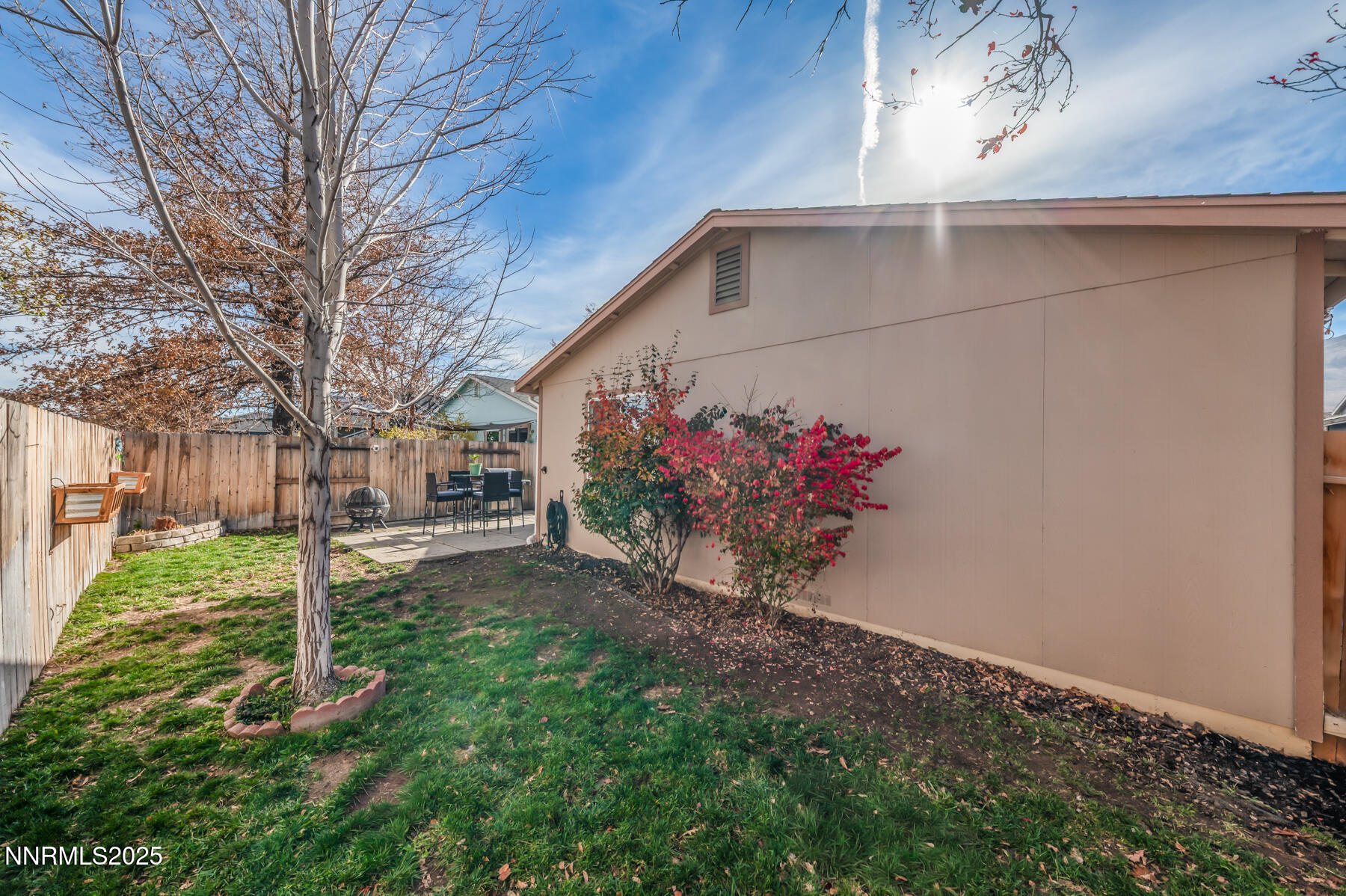7447 Findhorn Drive Reno, NV 89506 - Photo 20 of 27 a view of a house with a yard