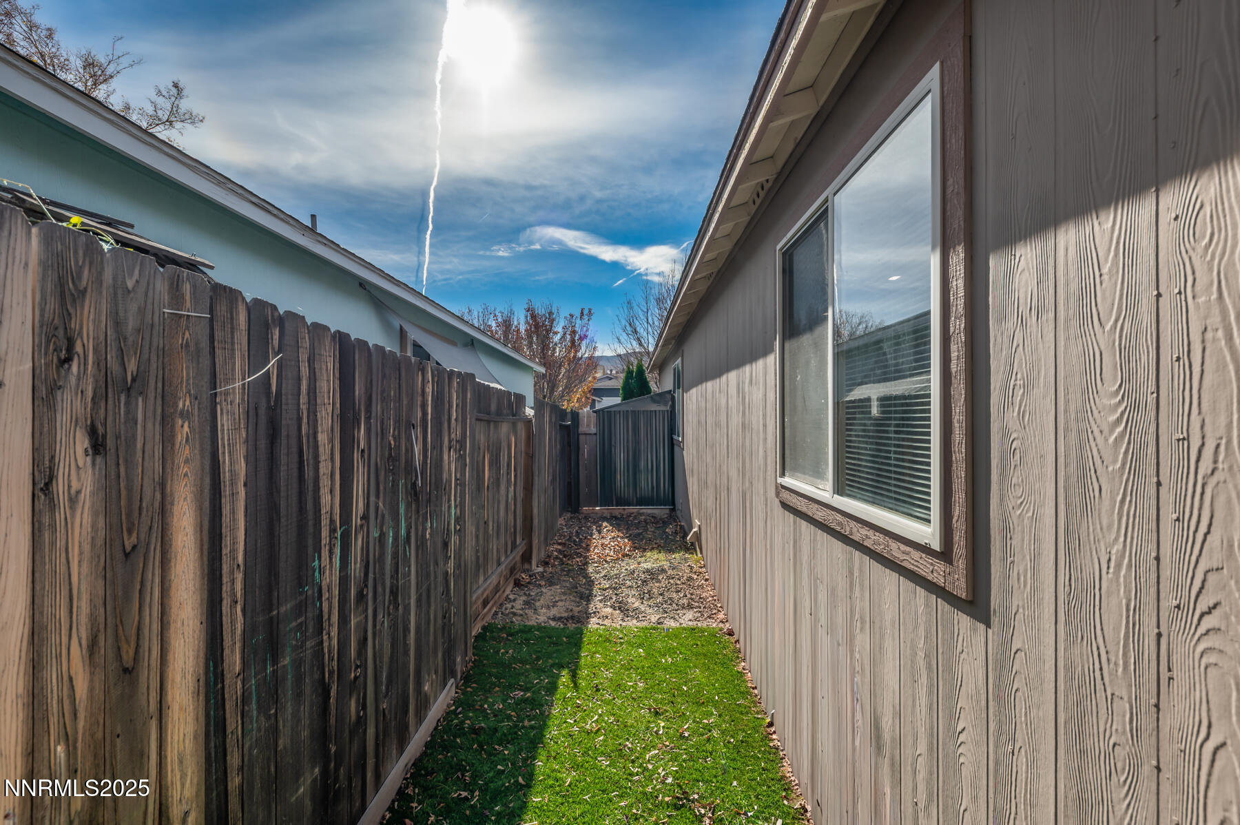 7447 Findhorn Drive Reno, NV 89506 - Photo 22 of 27 a view of a house with a backyard and pathway