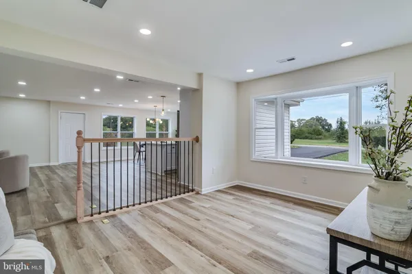 a view of a livingroom with furniture and window