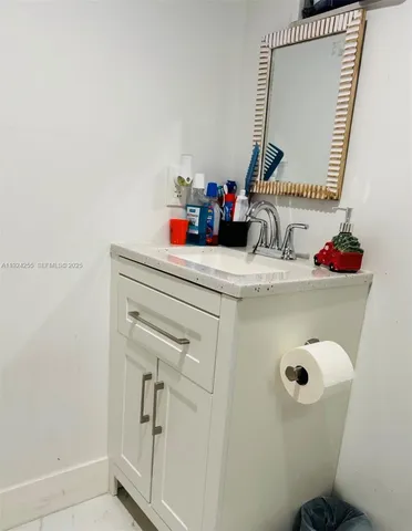 a bedroom with a bed and a stove