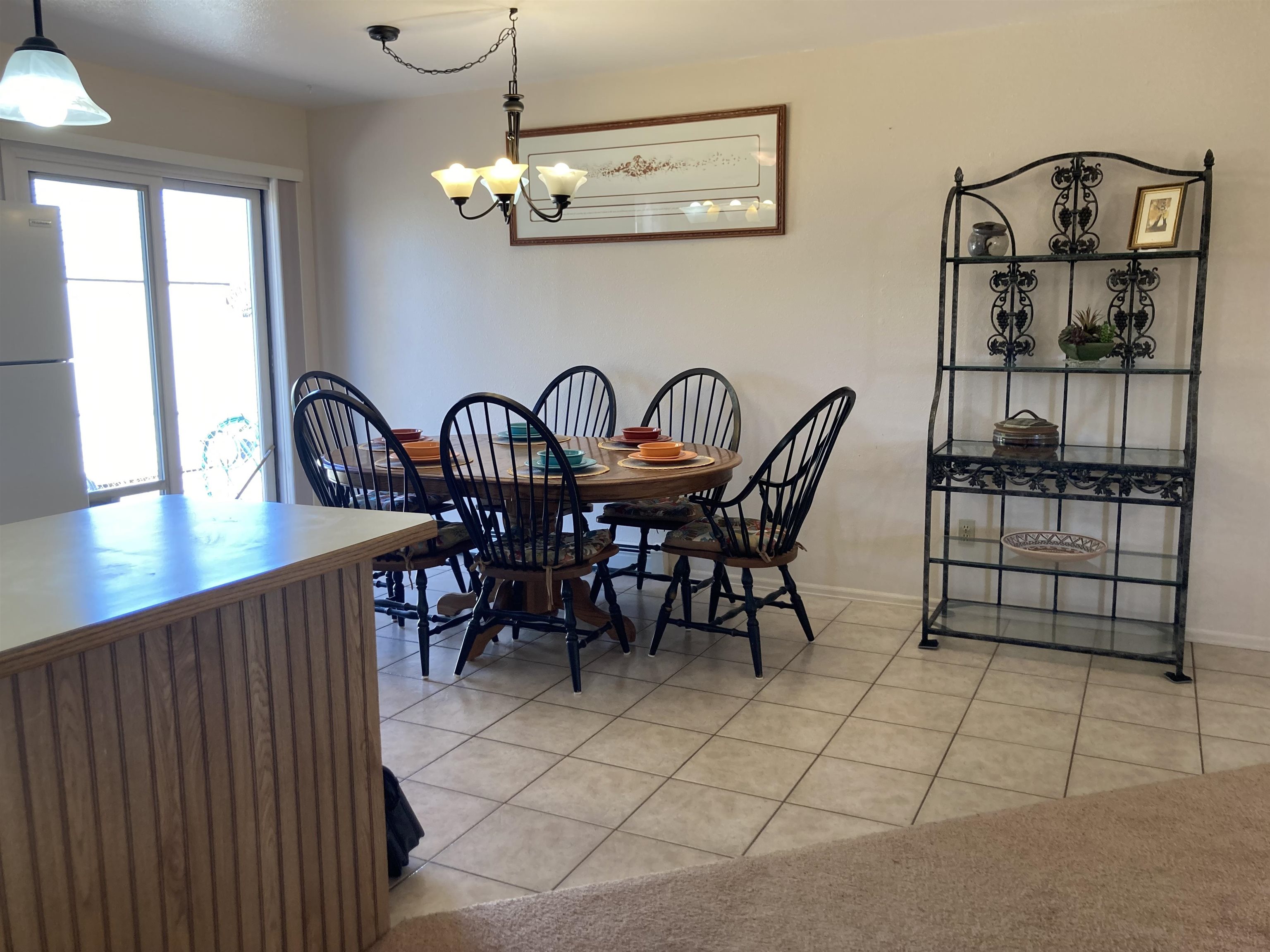2936 El Torro Road Grand Junction, CO 81503 - Photo 13 of 25 a view of a dining room with furniture