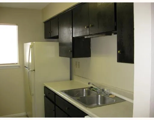 a view of empty room with windows