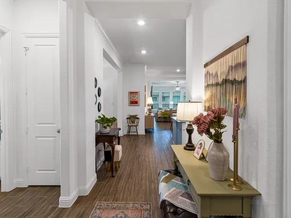 a living room with furniture flat screen tv and a fireplace