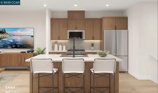 a kitchen with a dining table and chairs