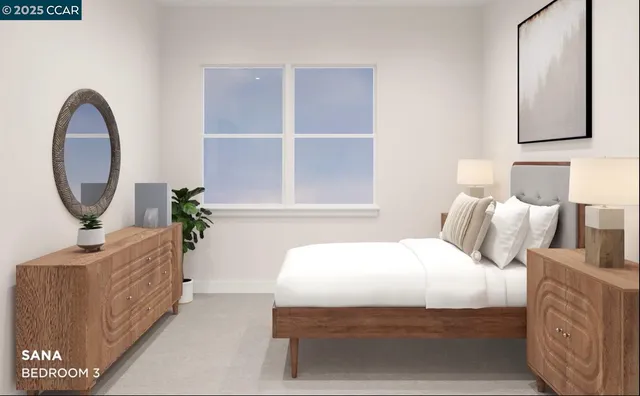 a bedroom with a bed a mirror and a potted plant