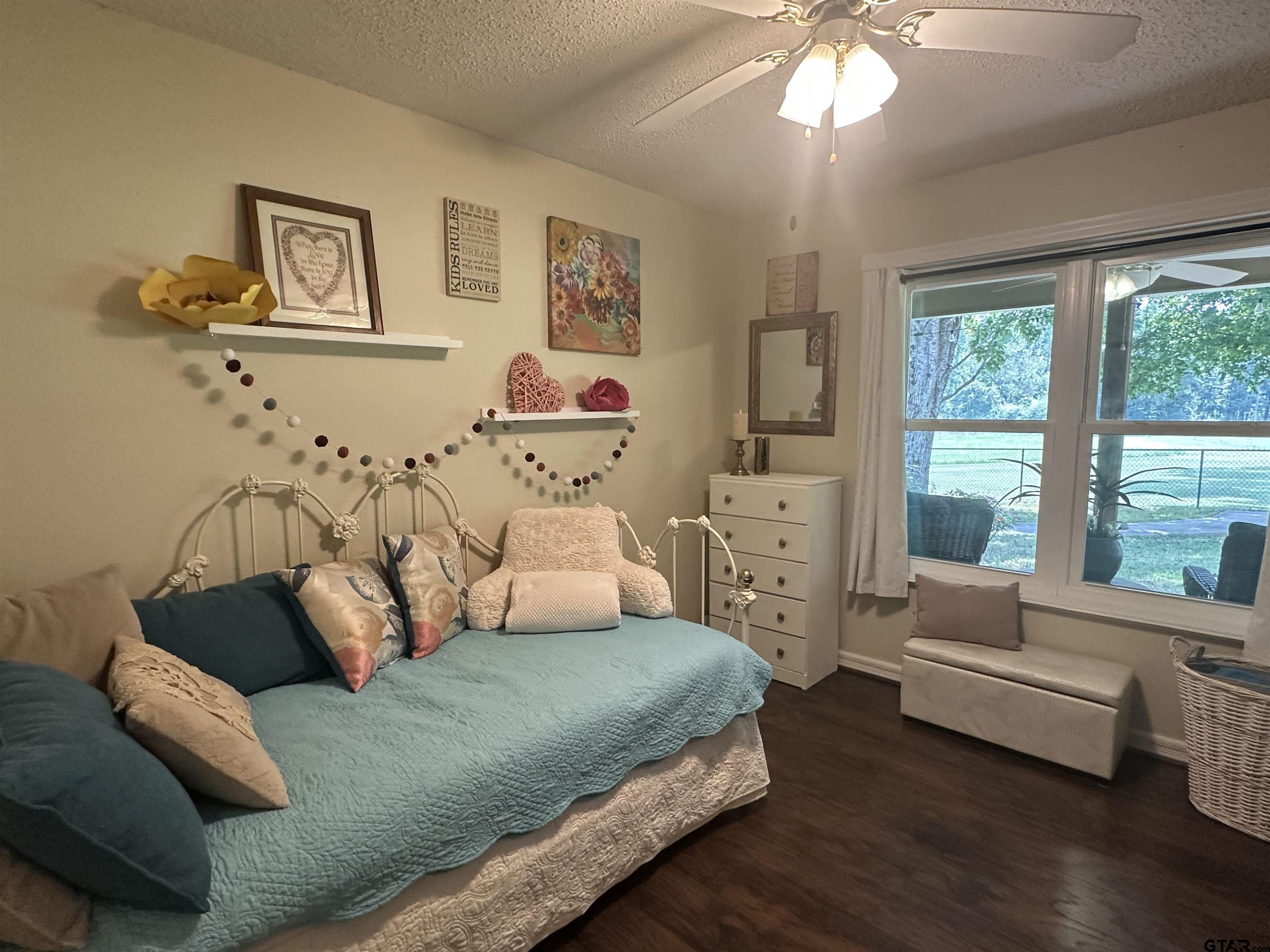 2281 Fm 241s Rusk, TX 75785 - Photo 13 of 31 a bedroom with a bed and a couch