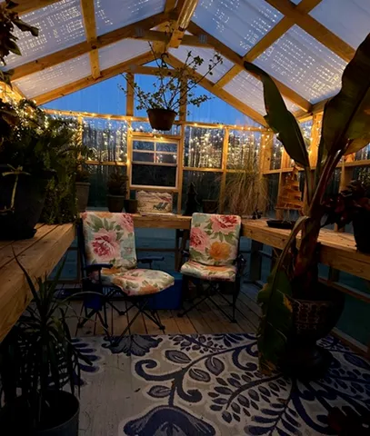 a backyard view with sitting space