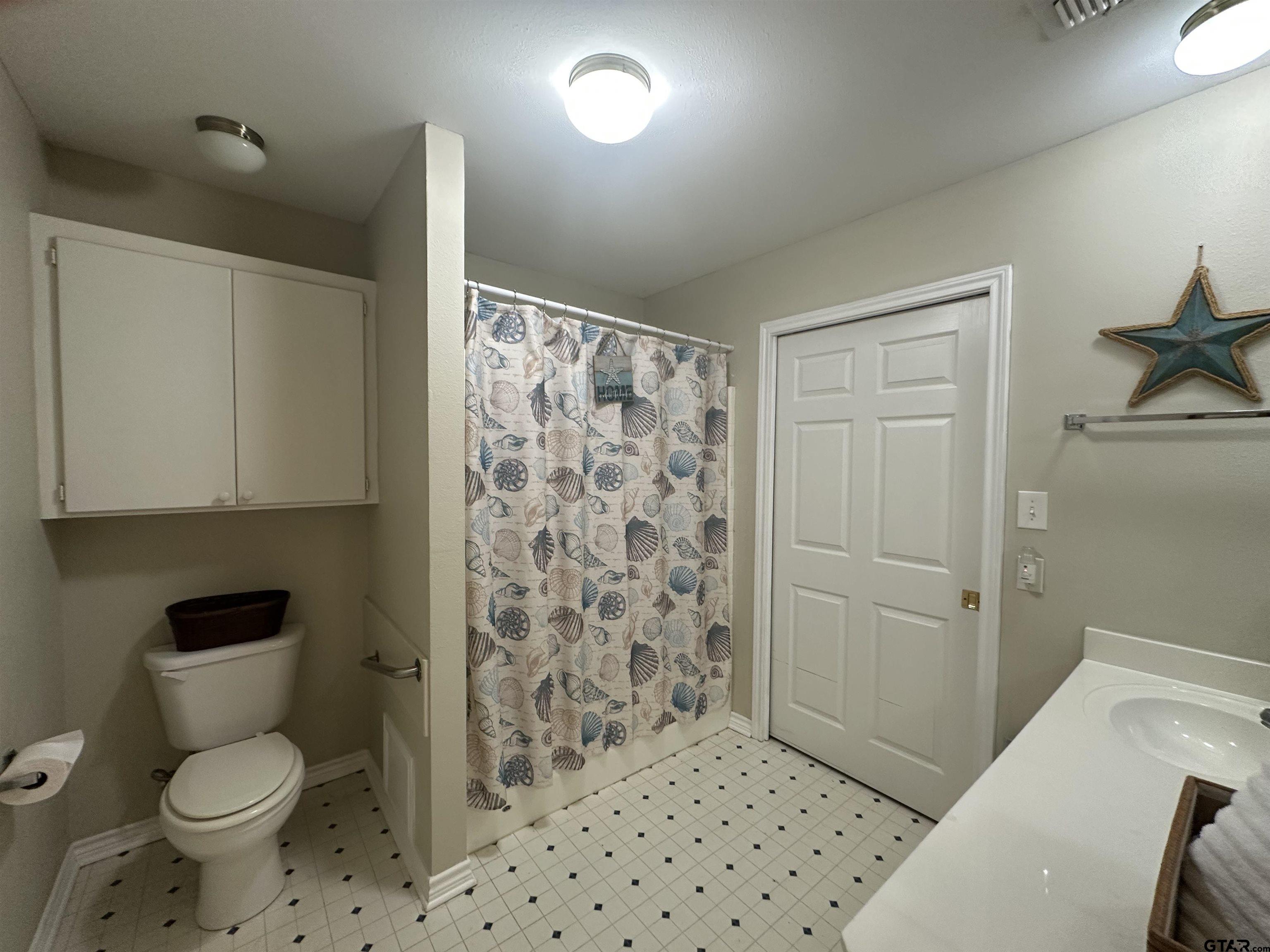 2281 Fm 241s Rusk, TX 75785 - Photo 28 of 31 a bathroom with a toilet sink and shower