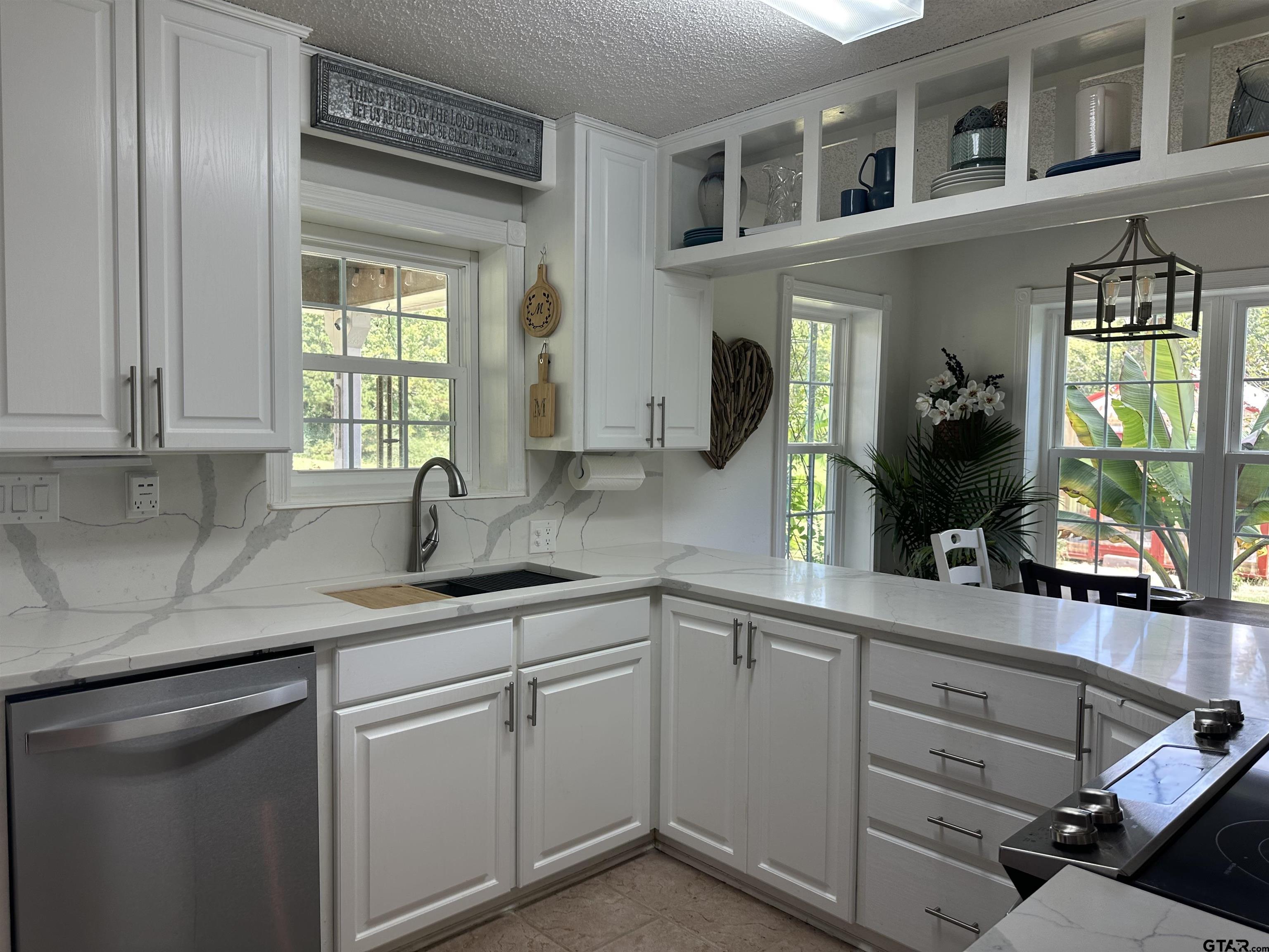 2281 Fm 241s Rusk, TX 75785 - Photo 6 of 31 a kitchen with cabinets appliances and a window