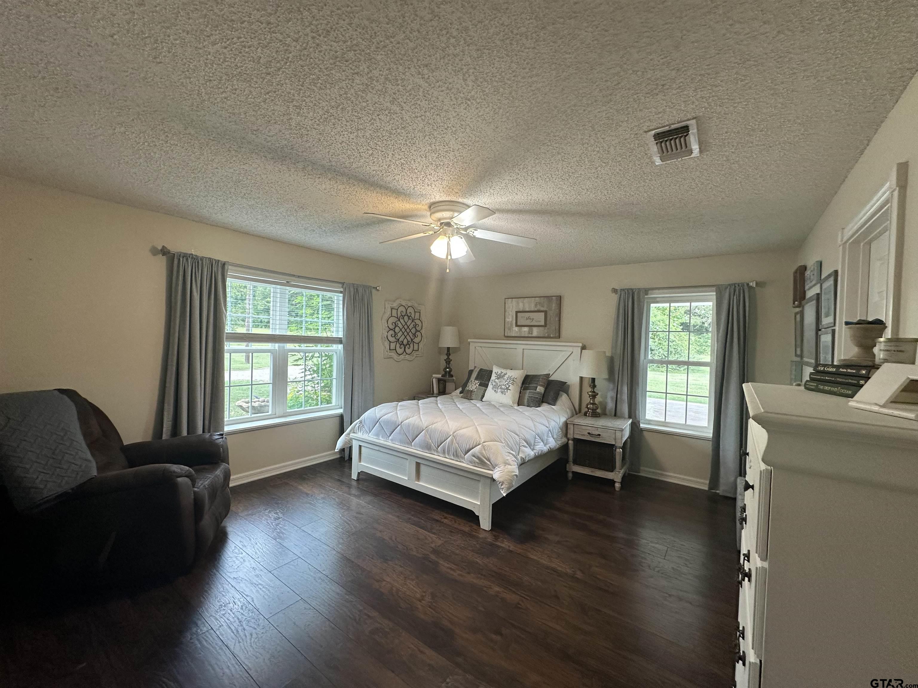 2281 Fm 241s Rusk, TX 75785 - Photo 8 of 31 a spacious bedroom with a bed and a couch