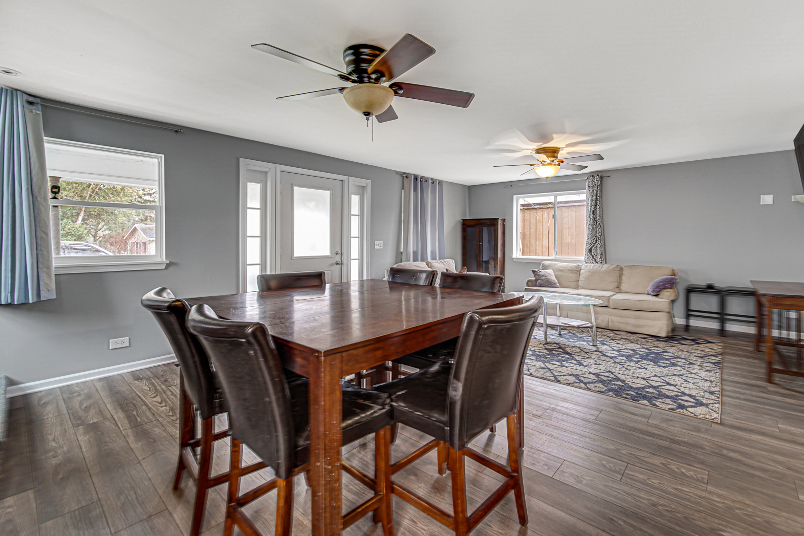 1812 Main St Road Spring Grove, IL 60081 - Photo 8 of 29 a view of a dining room with furniture window and wooden floor