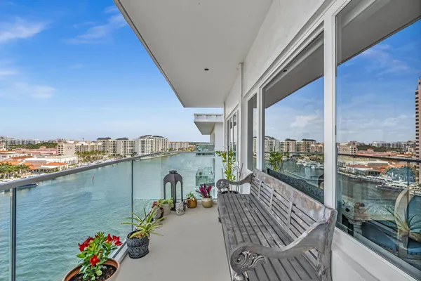 a view of a living room and floor to ceiling window