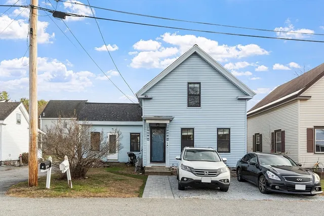 a car parked in front of a house