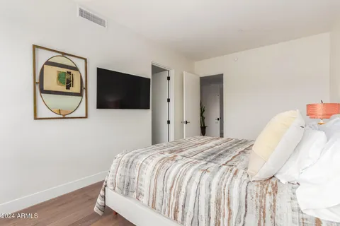 a bathroom with a double vanity sink mirror and double