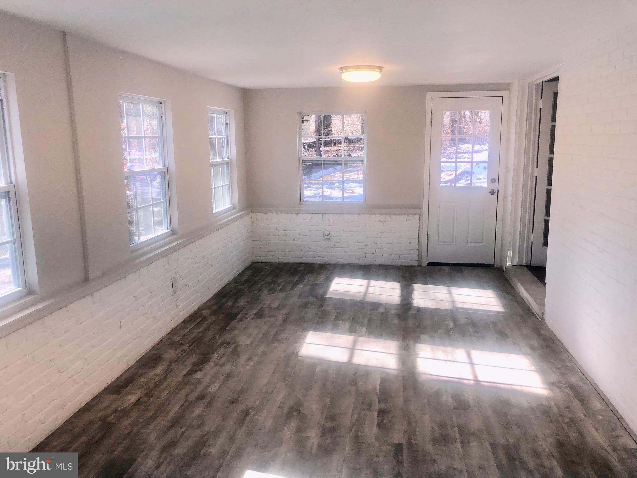 2112 Drury Road Silver Spring, MD 20906 - Photo 12 of 29 SUNROOM OFF THE KITCHEN