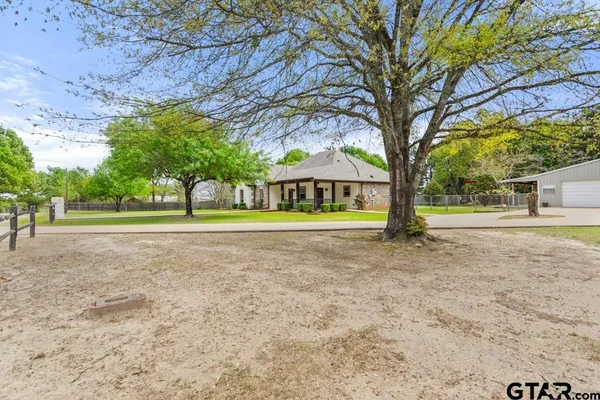 a house with trees in front of it