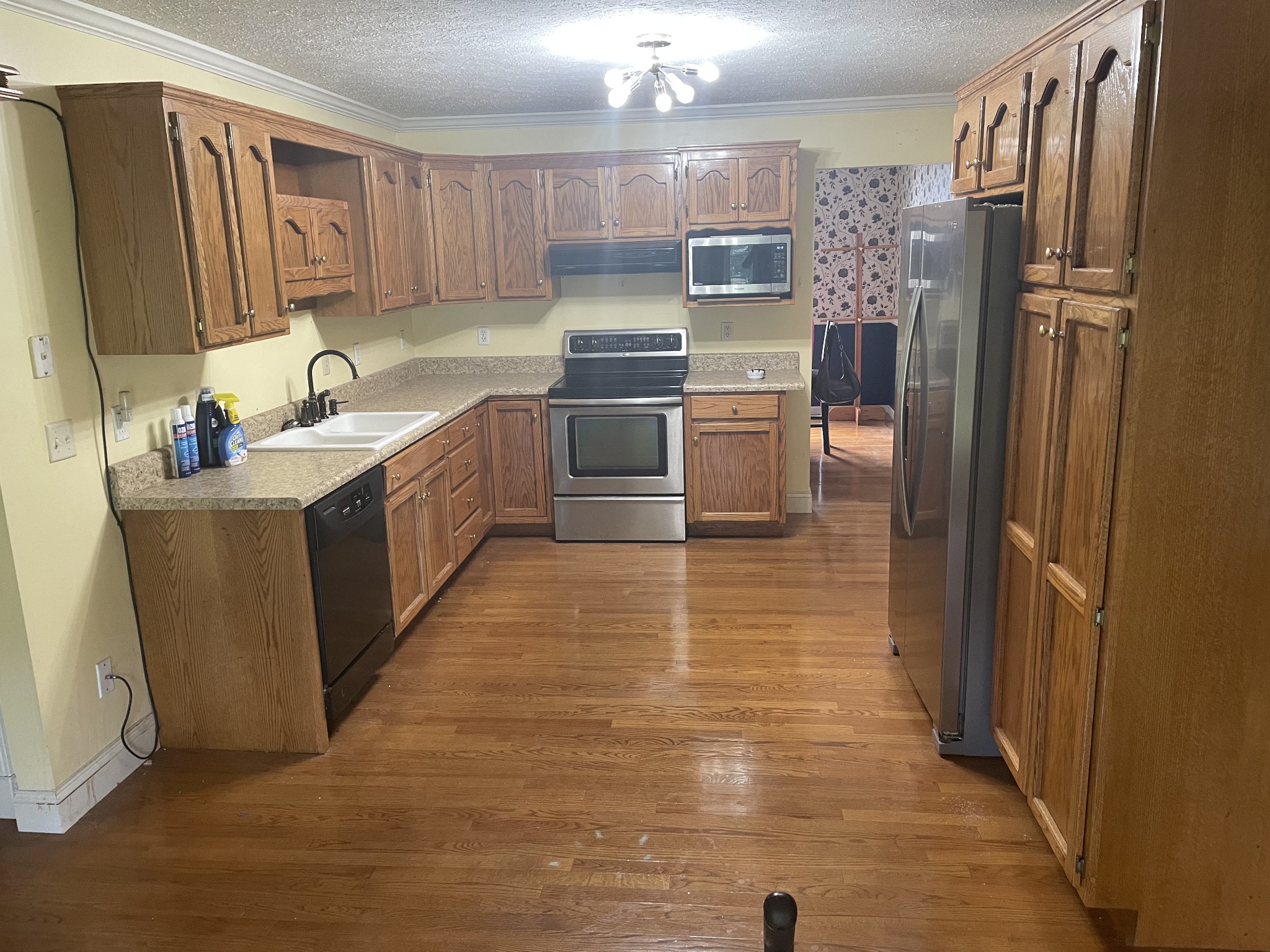 1799 Ragsdale Road Manchester, TN 37355 - Photo 12 of 17 a kitchen with granite countertop a refrigerator and a sink
