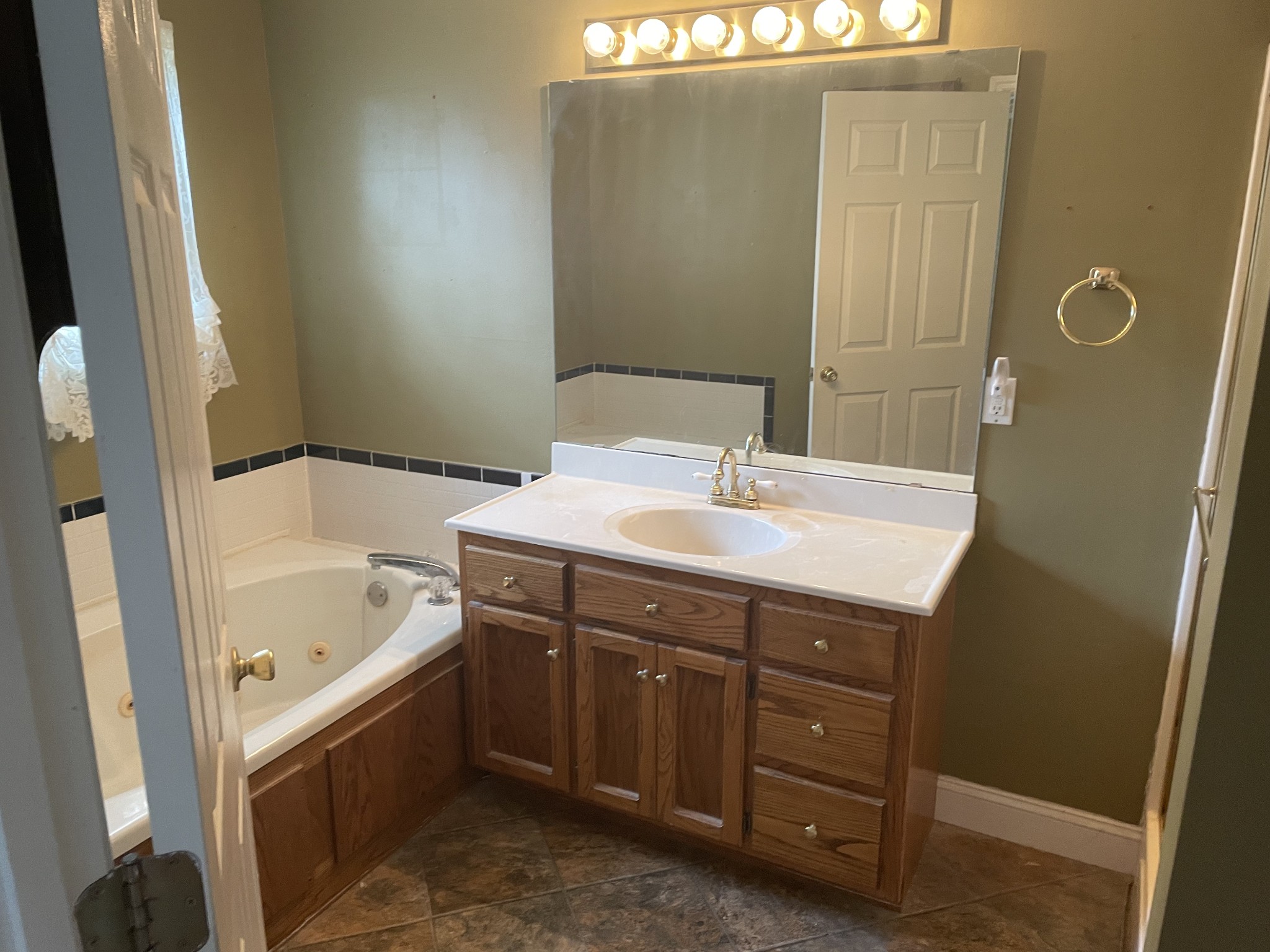 1799 Ragsdale Road Manchester, TN 37355 - Photo 13 of 17 a bathroom with a sink and a bathtub