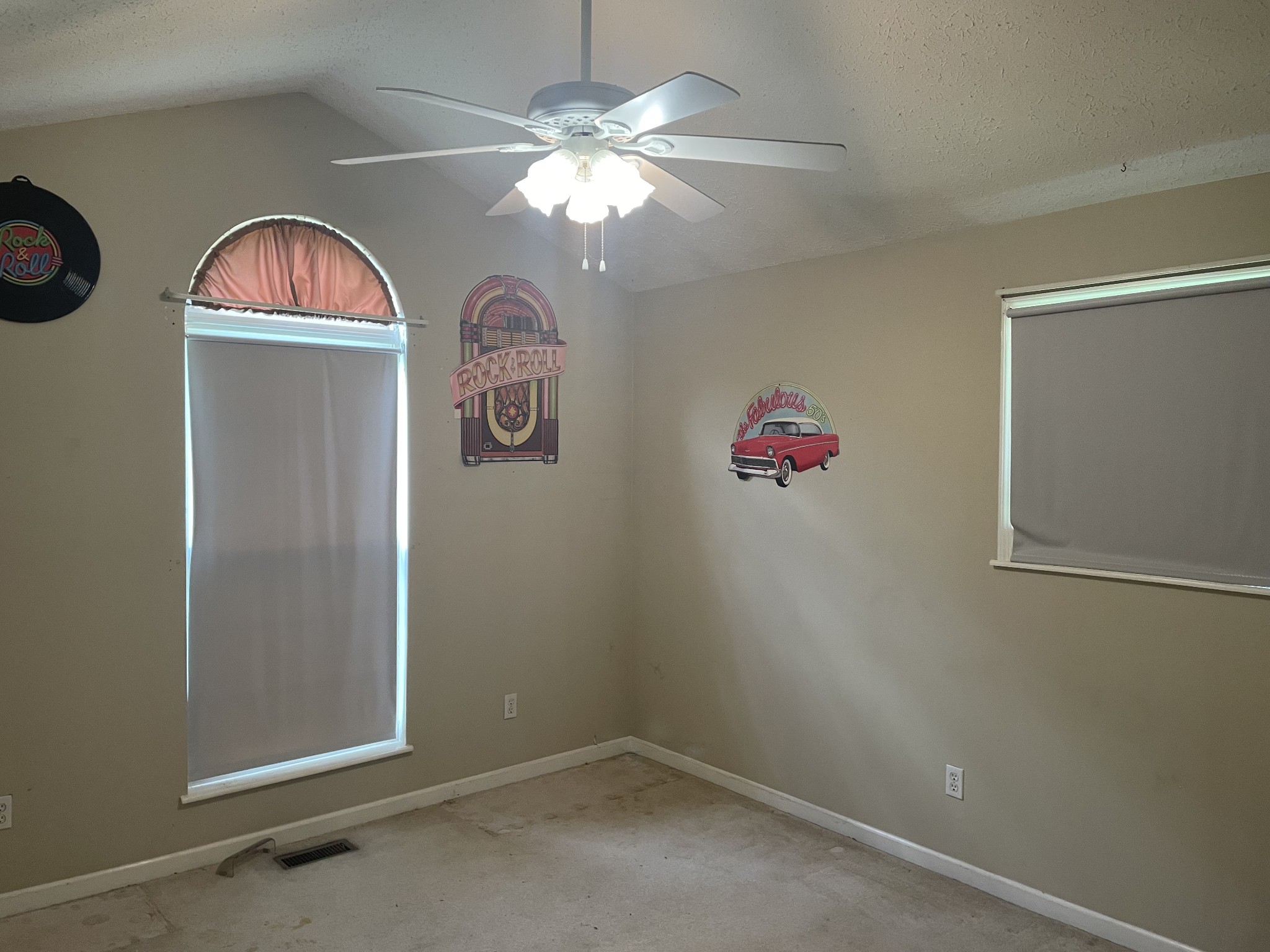 1799 Ragsdale Road Manchester, TN 37355 - Photo 15 of 17 an empty room with windows and fan
