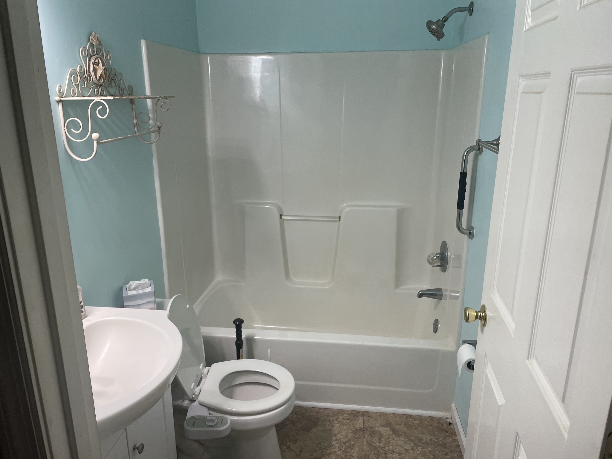 1799 Ragsdale Road Manchester, TN 37355 - Photo 16 of 17 a bathroom with a sink toilet and shower