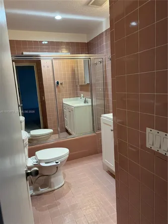 a view of a room that has a window