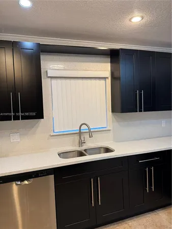 a view of a livingroom with a staircase