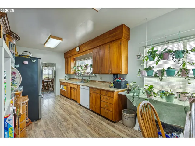 a living room with a couch and a dining table
