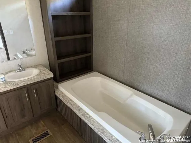 a bathroom with a sink and a toilet